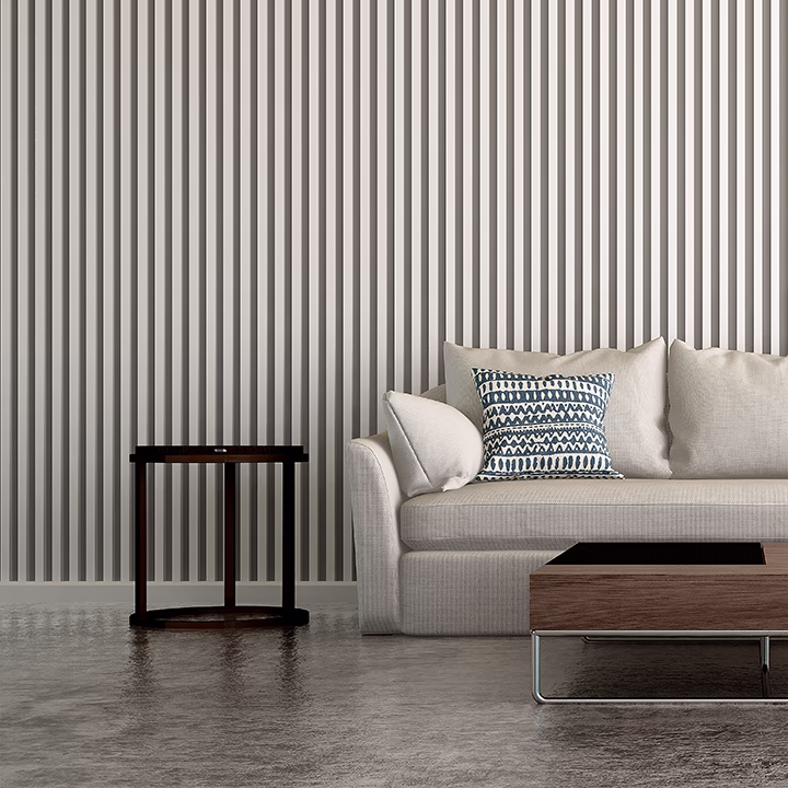 Nowoczesny salon z beżową sofą i modnymi lamelami na ścianie