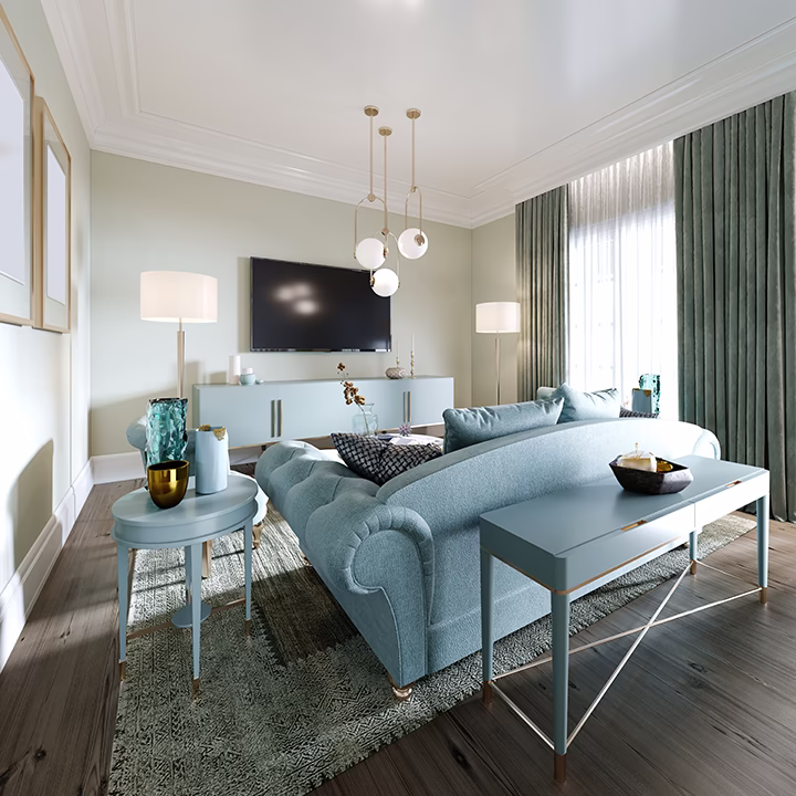 Nowoczesny salon z błękitną sofą i złotymi dodatkami, projekt Warszawa.